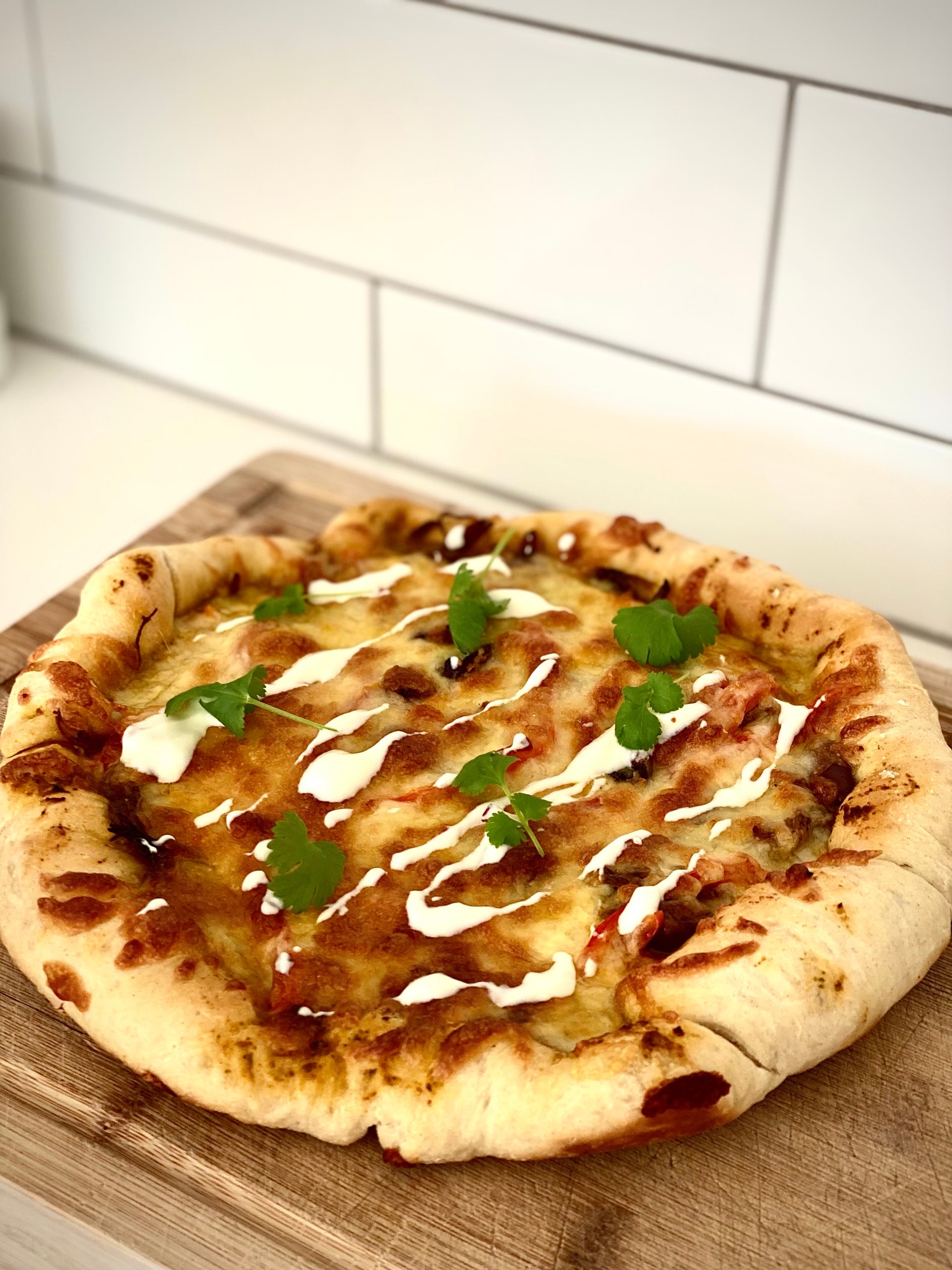 Moroccan Lamb Pizza with a cheese stuffed crust